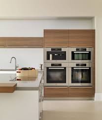 Contemporary White And Wood Kitchen Block Of Miele Appliances Miele Kitchens Miele Kitchen Modern Kitchen Ovens Modern Kitchen
