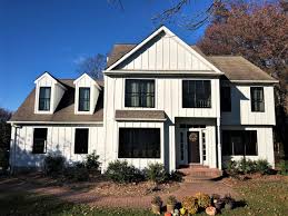 Some consumers have noted that out of the two brands, lp smartside siding has a more realistic wood appearance. Arctic White James Hardie Batten Board Fiber Cement Siding Modern Exterior By Global Home Improvement Houzz