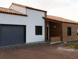 Toutes les menuiseries sont en pvc blanc hors mis les baies coulissantes qui elles sont en aluminium. Construction D Une Maison Ossature Bois Enduit Et Bardage Bois Photos De Travaux