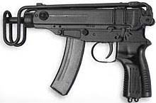 The rate reducer uses special sear which locks the bolt in the rearward position. Skorpion Wikipedia