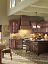 If You Love Traditional Cabinets Decora S Willshire Are Sure To Delight This Stunning Kitchen Highlig Decora Cabinets Stylish Kitchen Kitchen Island Cabinets