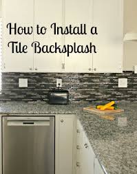 Update your backsplash from tile to sheet glass. How To Install A Glass Tile Backsplash She Buys He Builds