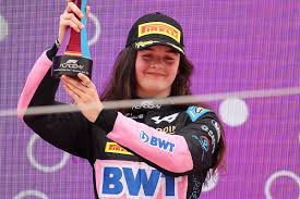 Abbi celebrating on the podium