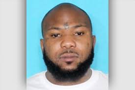 Man sought in early May murder