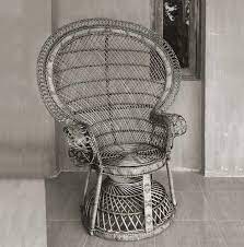 the iconic wicker lounge chair with its throne like design can make anyone feel regal lounge chair natural rat wicker lounge chair rattan furniture armchair