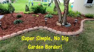 This evening i worked at neighbor cliffs as we installed some proflex no dig landscape edging. Super Simple No Dig Garden Border Youtube
