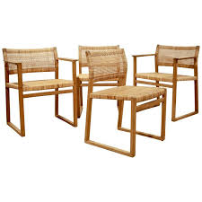 Borge Mogensen Dining Chairs In Oak And Woven Cane Denmark 1957 See More Antique And Mod Cane Dining Chairs Rattan Dining Chairs Dining Room Chairs Modern