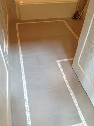 You can look through these pictures of bathroom mosaic tile borders and find ideas for your own bathroom. Floor Tile Designs With Borders Novocom Top