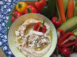Put the chickpeas, tahini, cumin or paprika, oil, garlic and lemon juice in a food processor, sprinkle with salt and pepper and begin to process; Stirring The Pot Ina Garten S Classic Hummus With Veggies Perfect Quarantine Snack