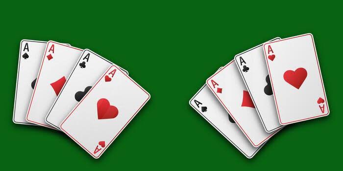 Two fans of playing cards in hand on black table. Aces with suits of  hearts, clubs, diamonds, spades. Poker and blackjack concept. Casino game,  gambling, luck, strategy, close up. 60024941 Vector Art