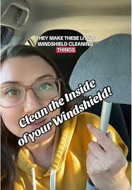 Cleaning Windshield with Kid