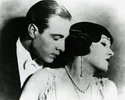 Right profile of Rudy after he emerges from the bay saving Gloria Swanson  in "Beyond The Rocks" (1922)