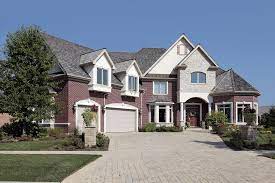 With roots dating back to 1675, cape cod was a popular style for homes built in the 1930s. Multilevel Suburban Brick House With Spacious Brick Driveway And Double Garage Suburban House Exterior Suburban House House Exterior