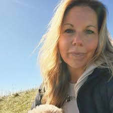 People holding signs at Walmart, assistance programs in Palatka