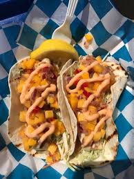 But the real gem of this recipe is the cabbage slaw—don't skip it. Fish Tacos Grilled Mahi Mahi With Broccoli Slaw Mango Salsa 7 Sriracho Mayo Picture Of Hooked Montauk Tripadvisor