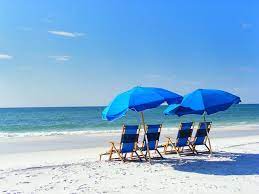 picture yourself relaxing under a large umbrella on a comfy beach chair while you watch the waves in beautiful seagrove b 30a beach seagrove beach destin beach