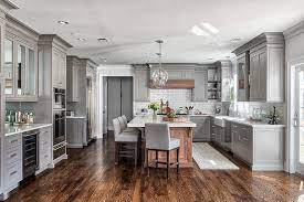 Mixing white or gray cabinets with dark wood finishes creates a gorgeous custom look for your kitchen. Grey Kitchen Design Home Bunch Interior Design Ideas