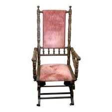 Clad in a durable, brown vinyl, this piece features a hardwood frame, padded armrests, coordinating head pillow, and padded footrest for the ultimate in comfort. Vintage New Antique Rocking Chairs Chairish