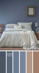 This color is a bit tricky as it reads gray on the paint chip, but in real like it looks a bit more blue than gray once it's on the walls. Blue Grey And Brown Bedroom
