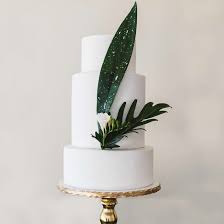 This elegant and simple design was chosen by the bride to match their silver and white wedding theme. 30 Stunning All White Wedding Cakes
