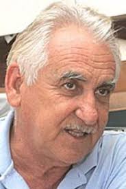 Tucci charged with embezzlement