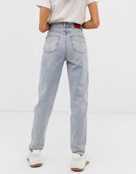 Fiorucci was initially launched in milan back in 1967 by elio fiorucci, the son of a shoe shop owner who felt inspired when returning home from a trip to london's carnaby street. Fiorucci Tara Classic Tapered Jean With Fiorucci Logo Tape Asos