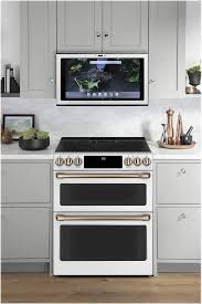 Fridges cost anywhere from $3,299 to $3,499, depending. Cafe 7 0 Cu Ft Slide In Double Oven Electric Induction Convection Range Matte White Chs950p4mw2 Best Buy