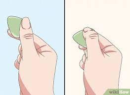 3 Cara Untuk Memegang Pick Gitar Wikihow