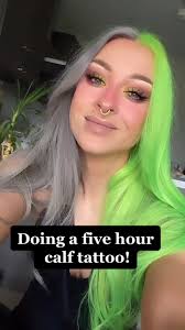 Blonde Scottish Tattoo Artist Working