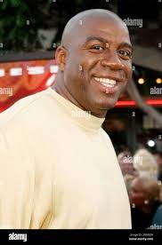Photo by: Lee RothSTAR MAXIPx 2021 3321 Magic Johnson joins Fanatics  Board. STAR MAX File Photo: 8502 Magic Johnson at the premiere of XXX.  (CA Stock Photo - Alamy