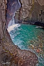 The waterfall is the climax of canyon creek, which spills thousands of gallons a water each minute over the falls. Box Canyon Waterfall Ouray Co David Kehrli Photography