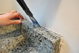 Removing The Side Splash Backsplash From Our Bathroom Sink Young House Love Diy Backsplash Tile Removal Vanity Backsplash