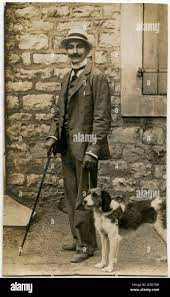 Man Taking A Dog For A Walk Date Circa 1920s Stock Photo Alamy