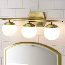 This modern and mid century inspired double sconce is a unique design piece handmade and handcrafted with sustainable materials in our studio. Modern Bathroom Light Fixtures Destination Lighting