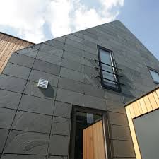 Einfamilienhaus In Symmetrischer Deckung Von Rathscheck Schiefer Schiefer Fassade Fassadengestaltung Gebaudefassade