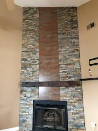 On fireplace inserts, the surrounds hide the gap between the insert and the edge of the fireplace. Ochre Corner Fireplace With Vertical Metal Insert