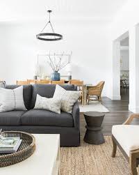 Charcoal Couch With Jute Rug Neutral Design In 2020 Floor Lamps Living Room Jute Rug Living Room Rugs In Living Room