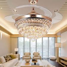 It is a combination of a unique modern crystal chandelier and a ceiling fan, ideal for a small room retractable blades: Golden Chandelier Ceiling Fan Light With Remote Control My Aashis