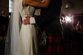 Kaitlin looked like a true princess in her wide tulle skirt with a long train. Outdoor Summer Wedding Ceremony Glamis Castle Wedding Photography