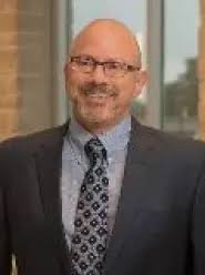 Dr. Aaron Calodney, MD