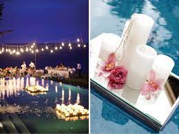 Candle glow pool candles floating best candles table top candles flower candle candle factory floating flowers backyard wedding pool. Gorgeous Pool Decorations For Weddings Belle The Magazine The Wedding Blog For The Sophisticated Bride Pool Wedding Pool Decor Floating Candles