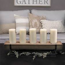 A fallen birch log look. Rustic Wood Candle Runner With Metal Stand Kirklands