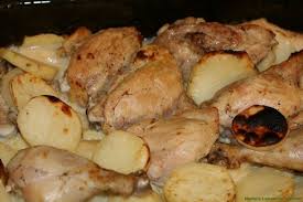 Baked Garlic Chicken And Potatoes Djej W Batata Bil Sayniyyeh Baked Garlic Chicken Baked Chicken And Potato Recipe Garlic Chicken