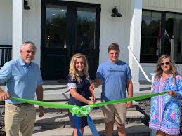 Nested beside the pointe, amongst ancient trees atop the northern cove of chesterman beach, the beach building faces the strand and morning to midday sun. Bay To Beach Builders Cuts Ribbon On New Model Home Design Center Cape Gazette