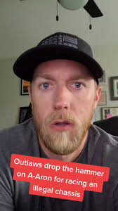 Aarok Reutzel Throwing A Bike at Racetrack