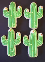 When ready to cut shapes, flip chilled dough so floured side is down. Cute Cactus With Hearts And Flowers Sugar Cookies Decorated Fancy Cookies Cute Cookies