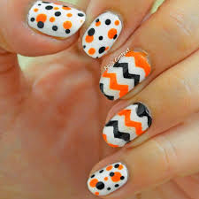 This cute and classic halloween look by tinytangerines is easily achievable at home with gold and orange nail try nail artist canishiea j. Easy Halloween Nails You Can Actually Do At Home Stylecaster