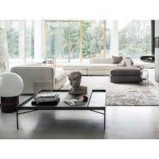 This rectangular transforming coffee table helps save space with its adjustable height glass top sitting lightly on a metal frame. Mansion Low Coffee Table Shop Online On Ciatdesign