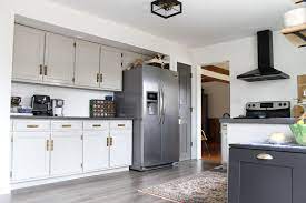 White kitchens, kitchen island design. 15 Rooms With Mindful Gray By Sherwin Williams Kitchen Cabinets Makeover Craftivity Designs