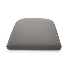 To add visual interest, top the chairs with black or saddle brown leather pads. Abaco Graphite Sunbrella Dining Chair Cushion Crate And Barrel